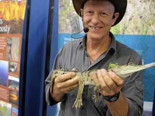 HANDS-ON LEARNING: Martin Fingland shows off his baby crocodile. Picture: Liana Walker