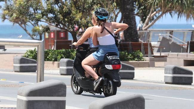 Schoolies on scooters in Surfers Paradise. Photo: Richard Gosling