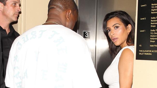 Kim Kardashian, Kanye West and a butt pad walk into a lift ...