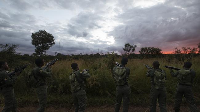 Akashinga rangers empty and check their rifles following a raid drill at the training centre at Phundundu Wildlife Park.