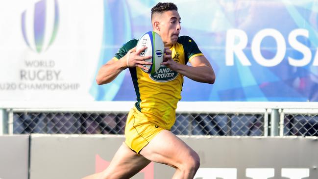 Mark Nawaqanitawase on his way to scoring fro Australia in the final match of the World Rugby u20 championship.