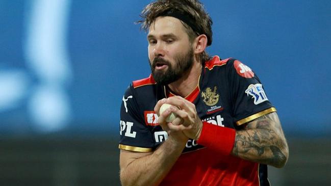 Kane Richardson of Royal Challengers Bangalore takes a catch of Manan Vohra of Rajasthan Royals during match 16 of the Vivo Indian Premier League 2021 between the Royal Challengers Bangalore and the Rajasthan Royals held at the Wankhede Stadium Mumbai on the 22nd April 2021. Photo by Rahul Gulati/ Sportzpics for IPL