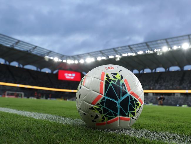 SYDNEY, AUSTRALIA - MARCH 21: A football is seen on the sideline of an empty Bankwest Stadium ahead of the round 24 A-League match between the Western Sydney Wanderers and Sydney FC at Bankwest Stadium on March 21, 2020 in Sydney, Australia. (Photo by Mark Metcalfe/Getty Images)
