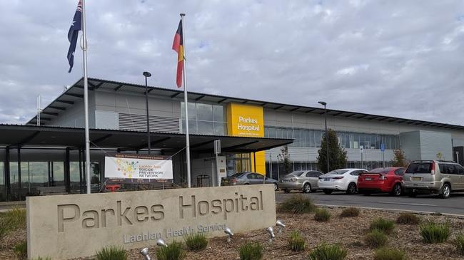 The 20-year-old woman was taken to Parkes Hospital for treatment.