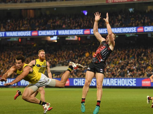 Alex Rance (left) received a free after copping the slightest of shoves from Shaun McKernan. Pic: AAP