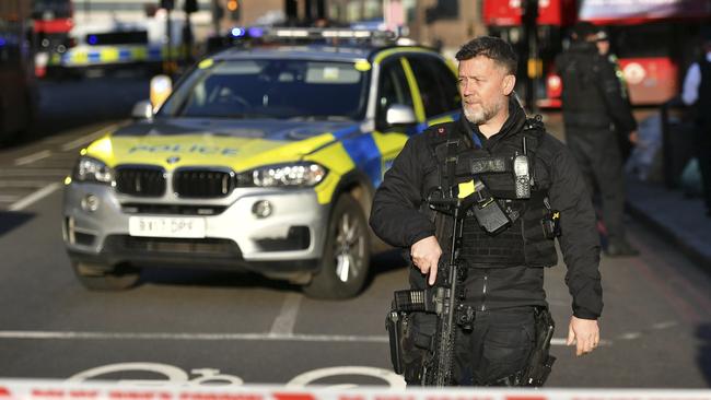 Police at the scene of an incident on London Bridge in central London. Picture: AP