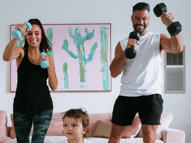 Sam Wood, his wife Snezana and his daughter Willow working out at home. Sam has joined the Channel 7 show Better Homes and Gardens in 2020.Picture: Supplied