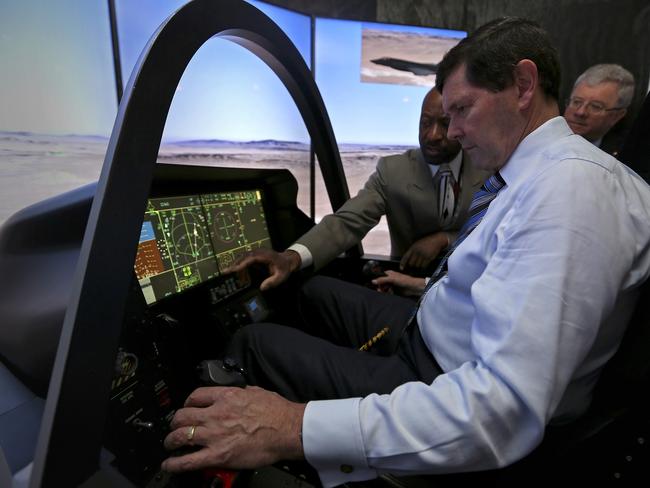 Sales talk ... Defence Minister Kevin Andrews inspects a simulated cockpit of the F-35 Lightning II. Source: Defence