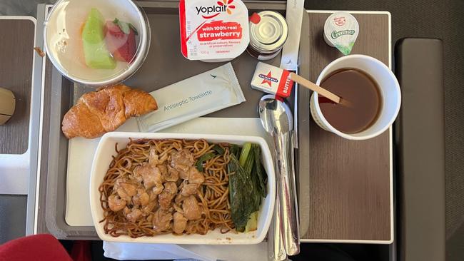 The foodKong Kong flavours are front and centre here, from the locally brewed Betsy beer to the egg tarts.For breakfast I had stir-fried egg noodles with light soy sauce, chicken and choy sum, which came with some fresh fruit, yoghurt and a croissant with jam.