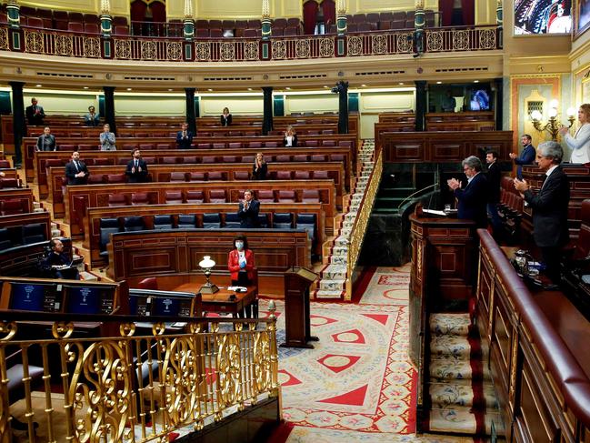 The Spanish parliament takes part in the daily gratitude applause to thank medical and health care personnel. Picture: AFP.