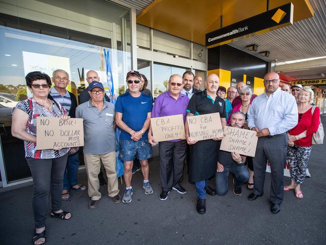 Traders, elderly locals and Federal Wills MP Peter Khalil (right) protest against the planned closure last week. Picture: Sarah Matray