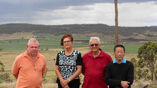 FLARING UP: Mt Tabor residents Bob Platt, Meryl Strand, Brian Moore and Thomas Shew said they were supportive of renewable energy, but the proposed location for the 154-hectare solar farm would be a 'tragedy' for the Southern Downs region. Picture: Marian Faa