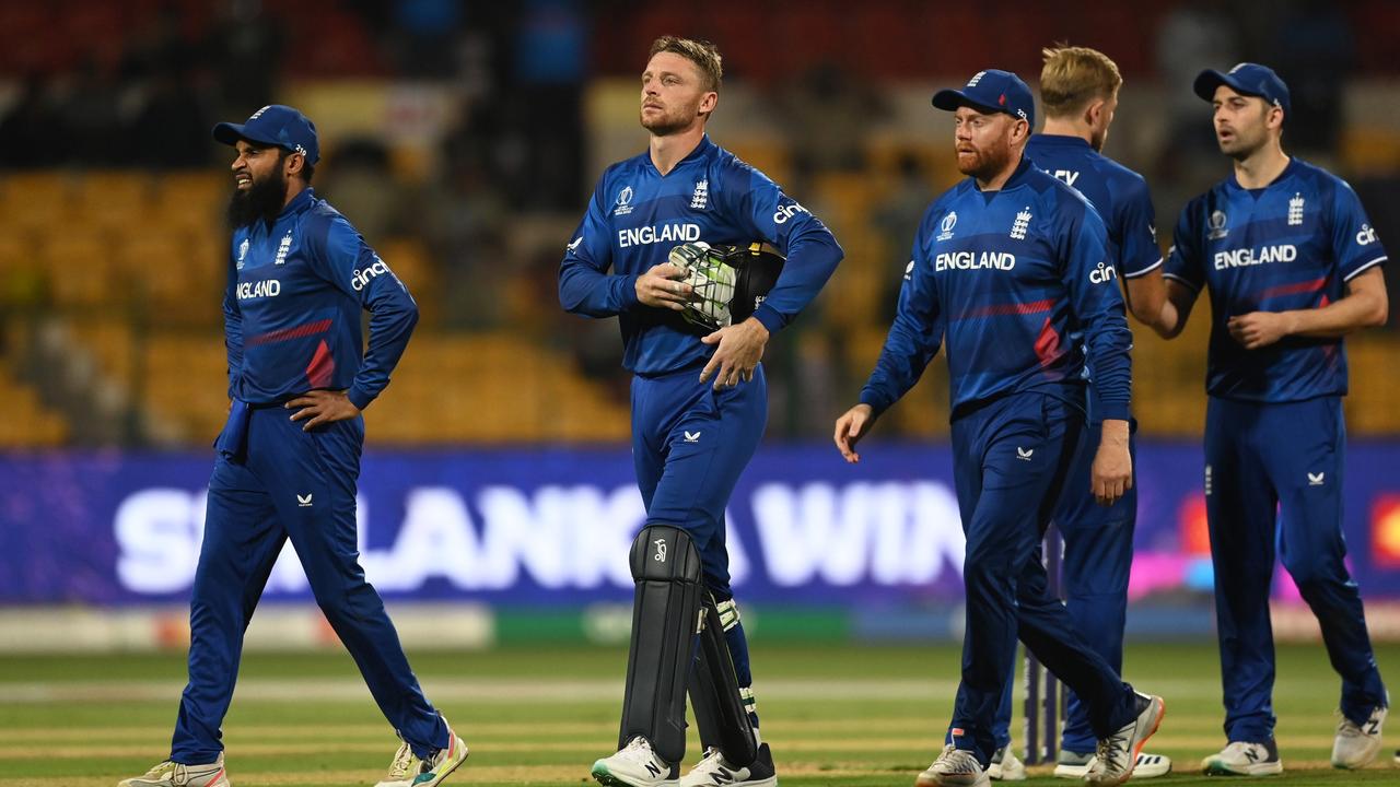 Adil Rashid, Jonny Bairstow and Jos Buttler cut dejected figures. (Photo by Gareth Copley/Getty Images)