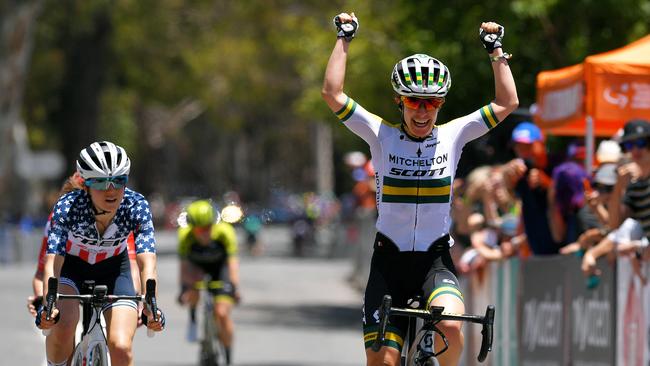 Amanda Spratt gives a double fist pump as she crosses the line first during Stage 2 of the Women’s Tour Down Under on Friday. Picture: Tim de Waele/Getty Images