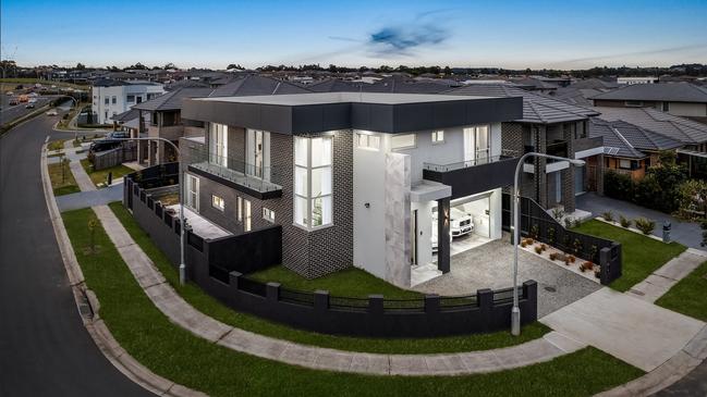 This five bedroom, three bathroom home in Carnes Hill is currently for sale at $1.679m. Picture: realestate.com.au/Ray White Carnes Hill