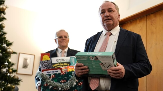 Deputy Prime Minister Barnaby Joyce and Prime Minister Scott Morrison donating gifts on Wednesday. Picture: Adam Taylor/Supplied