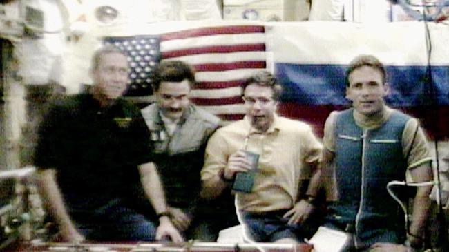 Jerry Linenger with other NASA astronauts in space. Picture: NASA