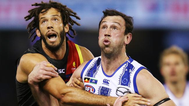 Zac Clarke locks horns with North Melbourne big man Todd Goldstein. Picture: Getty Images)