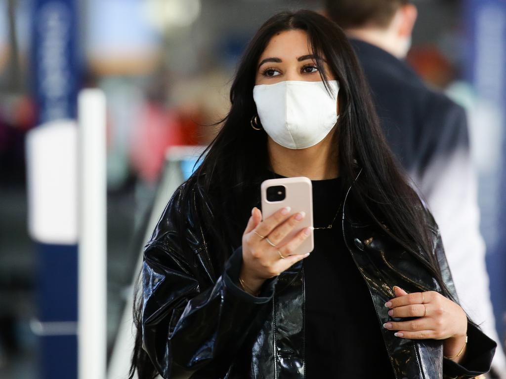 A woman wears a face mask at Sydney Domestic Airport. Picture: NCA NewsWire / Gaye Gerard