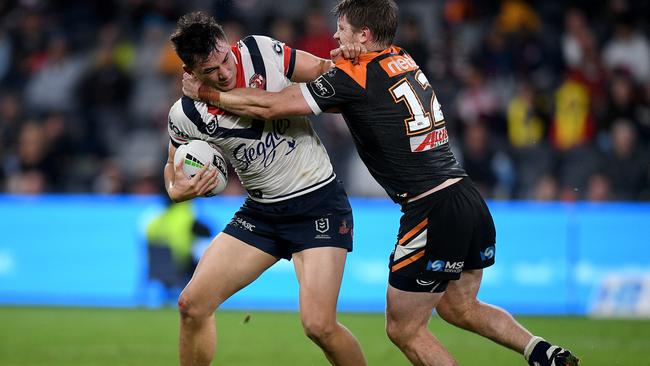 Joseph Manu got away with one for the Roosters. Image: AAP Image/Dan Himbrechts