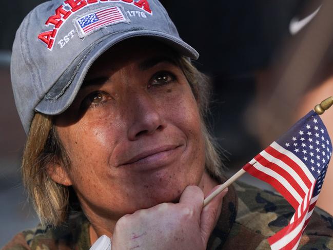 A Trump supporter looks on outside the Pennsylvania Convention Center after Joe Biden was declared winner of the 2020 presidential election on November 7, 2020 in Philadelphia, Pennsylvania. - Democrat Joe Biden has won the White House, US media said November 7, defeating Donald Trump and ending a presidency that convulsed American politics, shocked the world and left the United States more divided than at any time in decades. (Photo by Bryan R. Smith / AFP)