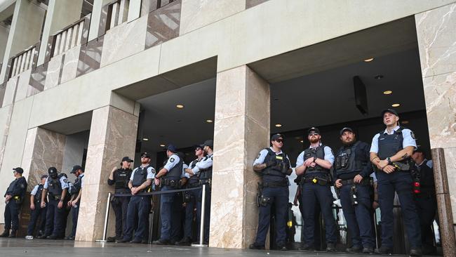 AFP offices blocked the front doors to Parliament House. Picture: NCA NewsWire / Martin Ollman