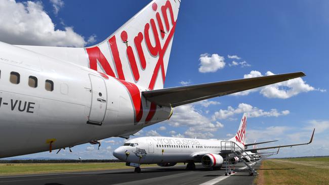 Grounded Virgin Australia aircraft at Brisbane airport. Picture: AAP