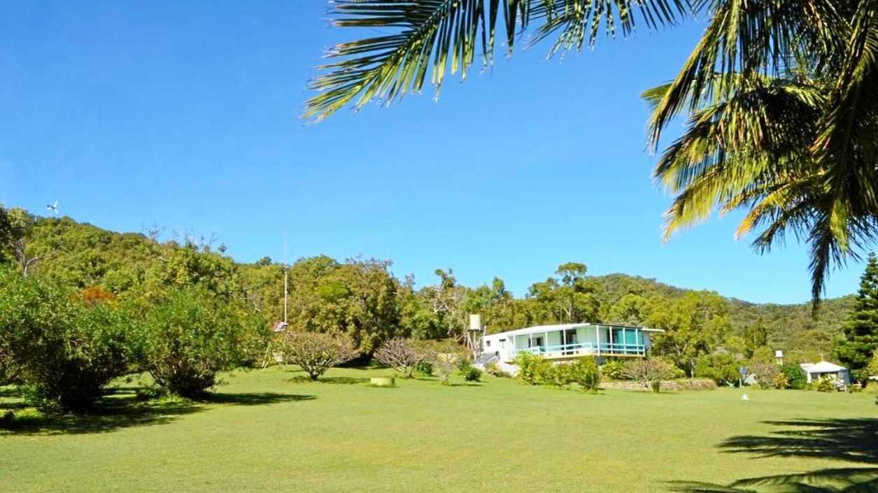 The cottage home has sweeping lawns and is a stroll to the beach. Picture: Contributed