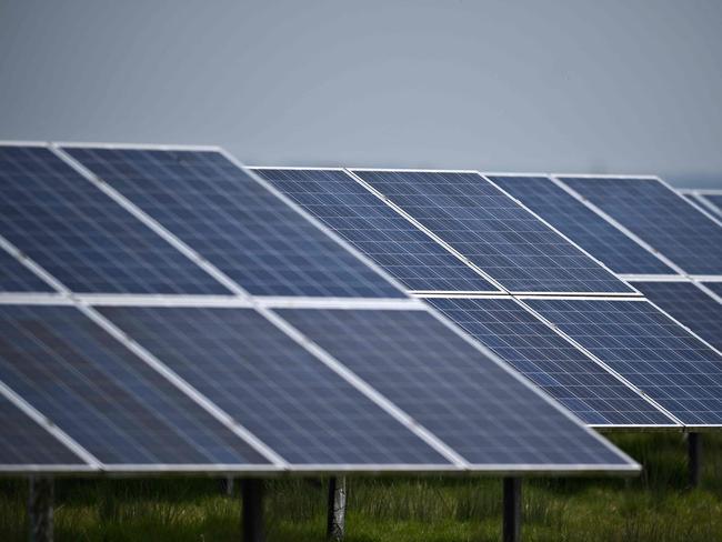 A photograph taken on April 18, 2022 shows the Sycamore Farm Solar Farm, in Old Romeny, south east England. - Sycamore Farm Solar Farm covers an area of 114 acres and contains 73,000 solar panels providing the national grid with 19MWp of power, enough to power over 6000 homes. (Photo by Ben Stansall / AFP)