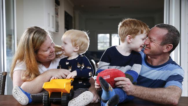 Police officer Victoria Lally, with her partner Sam and their sons Patrick and William, burst into tears when she heard childcare would be free. Picture: David Caird