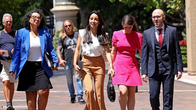 Antoinette Lattouf (2nd from left) leaving a Fair Work Commission hearing at the Wentworth Chambers in Sydney. Picture: Toby Zerna/AAP Image