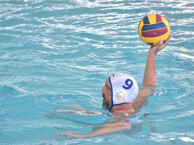 Water Polo Queensland Country Championships, 2nd World War Memorial Aquatic Centre, Rockhampton, February 18, 2023. Men, Mackay versus Sunshine Coast. Mackay player Clay Tucker.