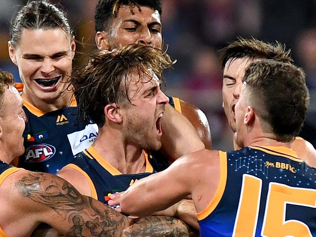 BRISBANE, AUSTRALIA - JUNE 01: Rhys Mathieson of the Lions celebrates kicking a goal during the round 11 AFL match between the Brisbane Lions and the Hawthorn Hawks at The Gabba on June 01, 2019 in Brisbane, Australia. (Photo by Bradley Kanaris/AFL Photos/Getty Images)