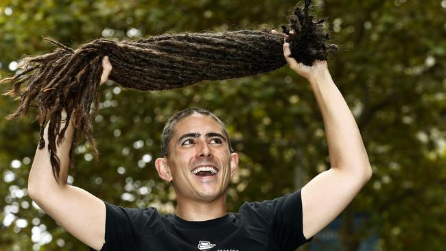 Dale Robinson holding his dreadlocks after getting the chop for the World’s Greatest Shave. Picture: John Appleyard