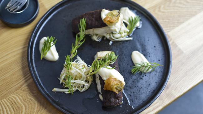 Roasted fillet of fish with celeriac, black garlic and tempura oyster. Photo: DANNIKA BONSER