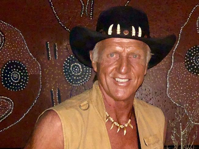 Golf legend Greg Norman dressed up as Crocodile Dundee for his Christmas party.