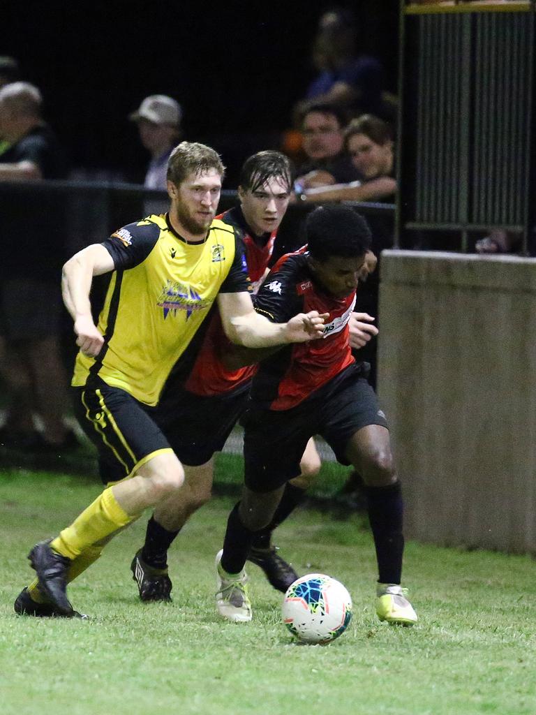 Tigers' Jesse Casson and Lions' Kaleab Agegnahu in the FNQ Premier League men's match between the Edge Hill Tigers and the Leichhardt Lions, held at Tiger Park, Maunda. Picture: Brendan Radke