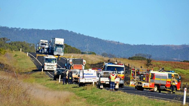 Police and emergency services at the scene of the crash on the Bunya Highway on Tuesday morning. Picture: Claudia Williams