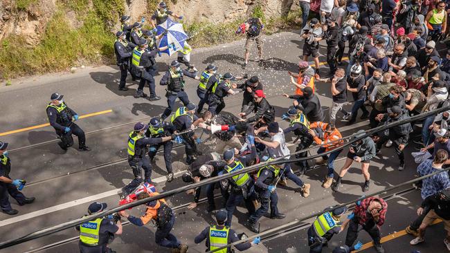 The mob clashes with police in Kew. Picture: Jason Edwards