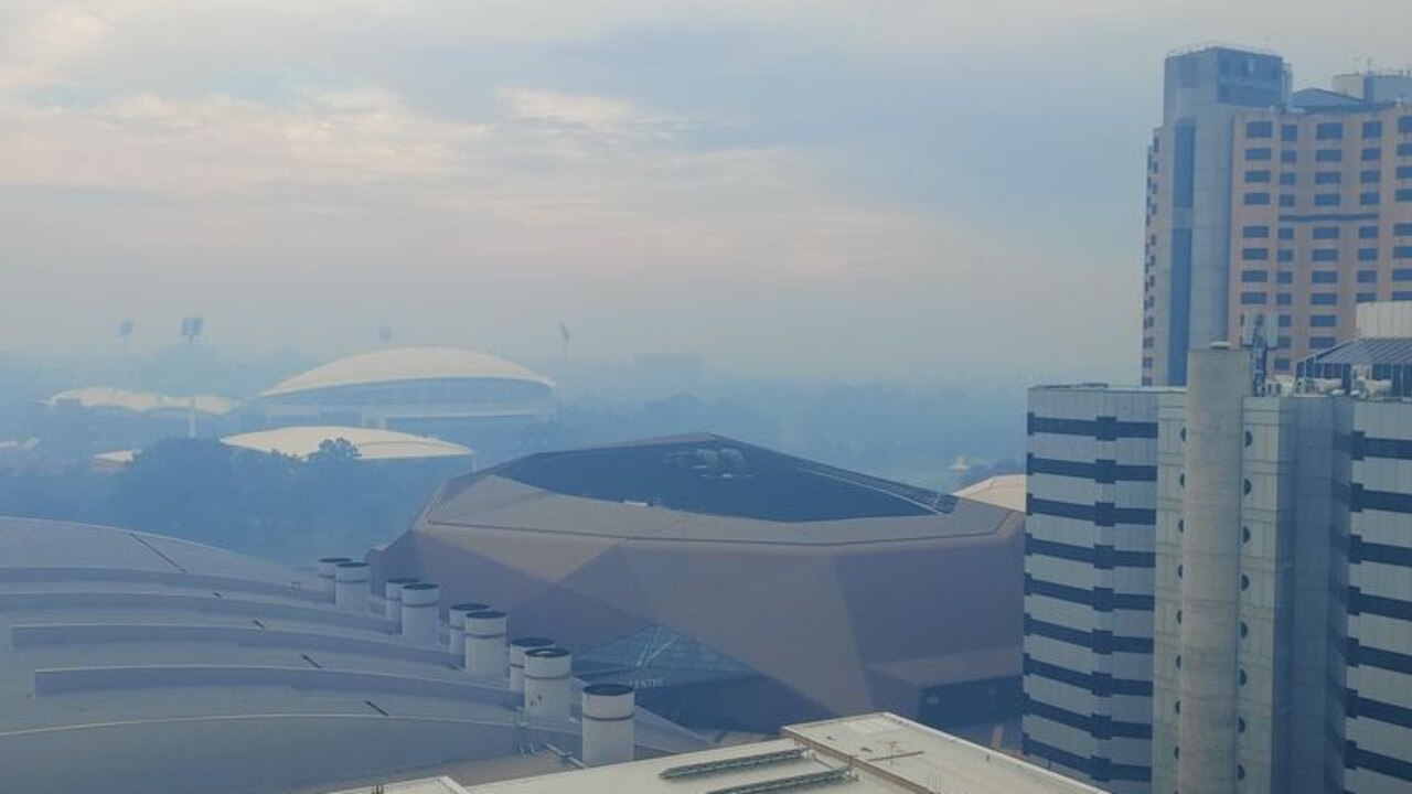 Smoke haze over the Adelaide CBD on Monday morning. The view from a balcony on North Terrace. Picture: Jarrad Horwood