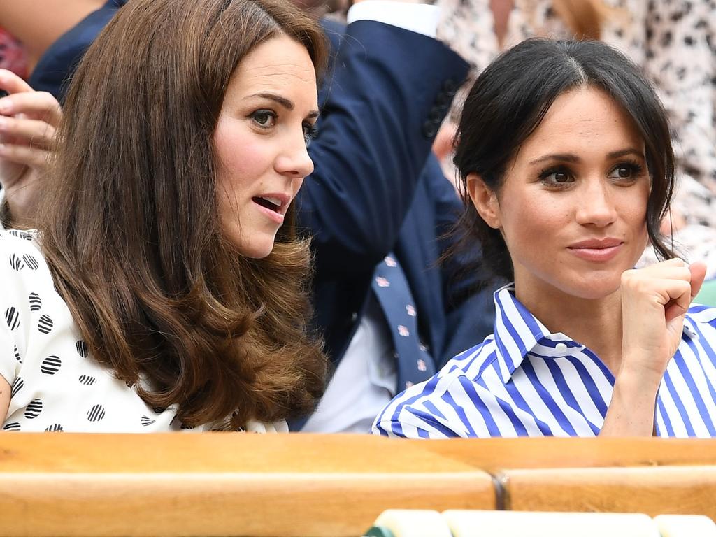 The Duchess of Cambridge and Duchess of Sussex at Wimbledon in July 2018. Picture: Clive Mason/Getty Images.