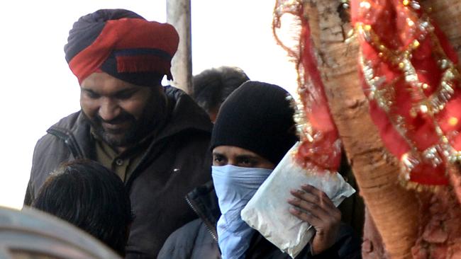 Puneet Puneet leaving court in Delhi in 2013.