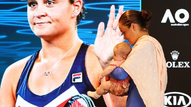 Ash Barty holds her niece Olivia during a press conference after her loss in the Australian Open semi-final. Picture: Getty Images