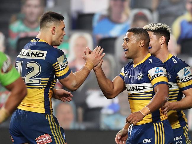 SYDNEY, AUSTRALIA - JUNE 27: Michael Jennings of the Eels celebrates with his team mates after scoring a try during the round seven NRL match between the Parramatta Eels and the Canberra Raiders at Bankwest Stadium on June 27, 2020 in Sydney, Australia. (Photo by Mark Kolbe/Getty Images)