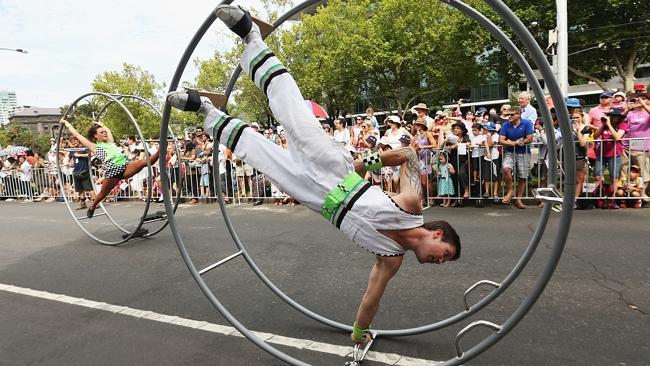 Acrobats perform during last year’s Moomba Parade.