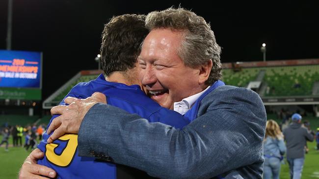 Andrew Forrest embraces Ian Prior of the Force at nib Stadium in Perth.