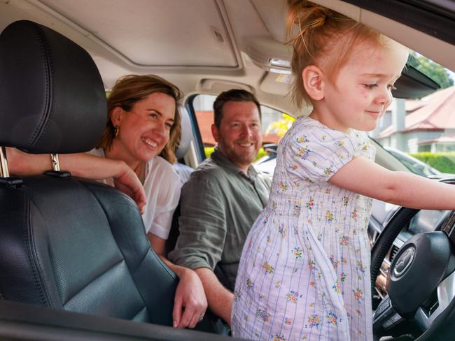 Pictured is Simon and Emma Grant, with their daughter Billie, 2, at home in Concord. Picture: Justin Lloyd.