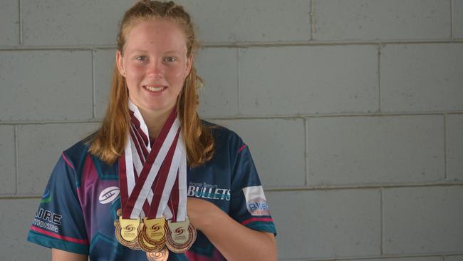 Sally Vagg proudly shows off her 10 medals