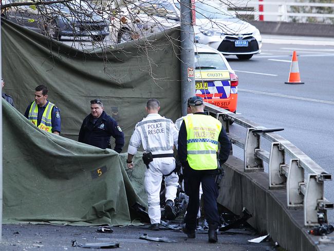 Police at the crash scene early today.