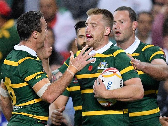 Cameron Munster celebrates a try during the World Cup.